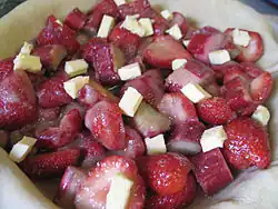 Crust filled with strawberries and rhubarb