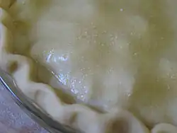 Milk brushed on top crust and sprinkled with sugar