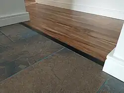 …and the flooring in the adjacent areas. This is interlocking engineered hardwood flooring.