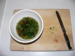 1. Mix marsala wine, water, chopped parsley, and rosemary in a bowl.