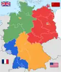 How the remainder of Germany was divided. The red part is East Germany. The orange, green and blue parts became West Germany
