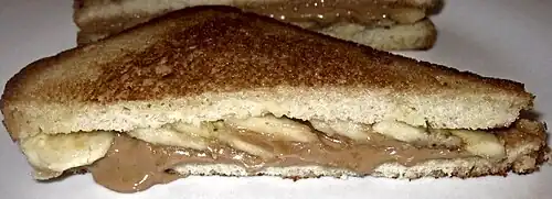 A sandwich made with natural peanut butter