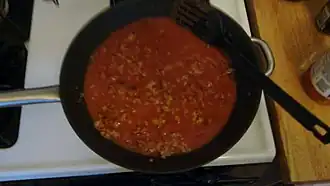 After mixing in meat-flavored pasta sauce.