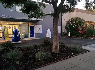 Security robots patrolling an area, freeing up human guards for other tasks.