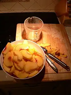 Prepare sliced peaches