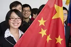 Chinese students with the PRC flag at .