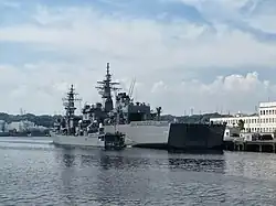 JS Ōyodo and JS Uraga at Yokosuka on 22 September 2013.