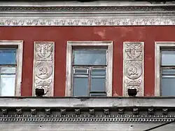 Stalinist cornucopias on the administration building of the "Kryvbasshahtoprohidka" and "Pivdenruda" associations, Kryvyi Rih, Ukraine, unknown architect, 1950s