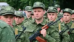 Russian troops, wearing the second more elaborate style of patrol cap, during 2022 Russian mobilization in Sevastopol's Nakhimov Square.