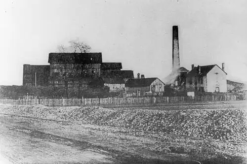 The washhouse building on the left and the boiler chimney on the right around 1900 (the well building is already demolished here).