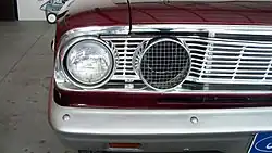 Detail of the ram-air intake setup and painted fiberglass bumper