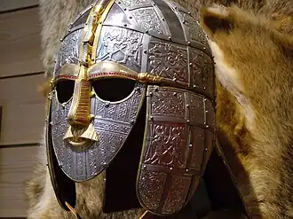 Colour photograph of a modern replica of the Sutton Hoo helmet.