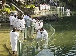 Baptism ceremony at Yardenit