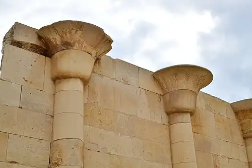 Ancient Egyptian engaged columns of the House of the North, detail of papyrus-shaped capitals, in the Heb-sed court of Djoser's Funerary Complex, Saqqara, Egypt, unknown architect, 2667-2648 BC[2]