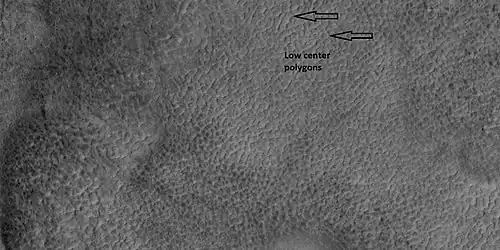 Low center polygons, shown with arrows, as seen by HiRISE under HiWish program Image was enlarged with HiView.