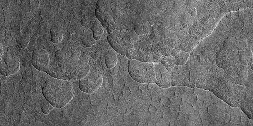 Scalloped terrain, as seen by HiRISE under HiWish program