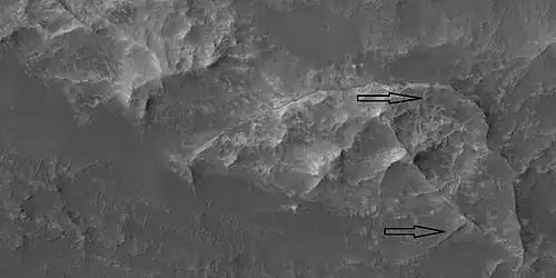 Close view of ridges, as seen by HiRISE under HiWish program. Arrows point to some ridges.