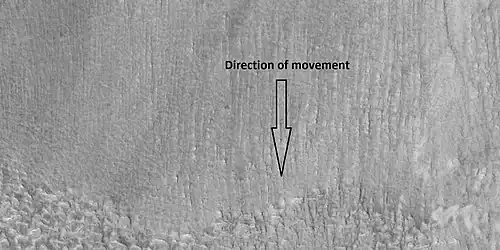 Grooves caused by movement of glacier, as seen by HiRISE under HiWish program