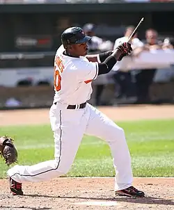 An image of Baltimore Orioles player Adam Jones with a broken bat after swinging at a pitch in 2008.