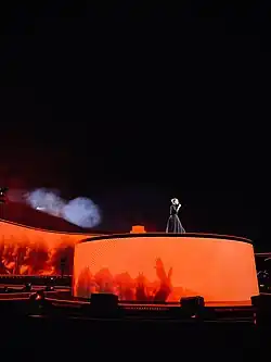 Adele performs on a secondary stage that ascends into the air