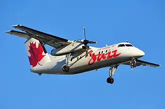 Dash 8-100 In Red Jazz Livery