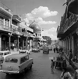 Al-Rashid Street in 1961 and the Haydar-Khana Mosque.