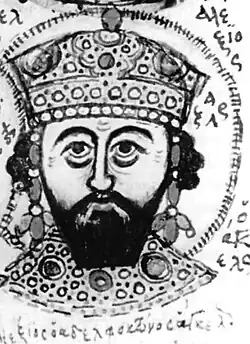 Black-and-white copy of a bust of a crowned, bearded man