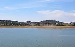 Arboles from a point across an arm of Navajo Lake