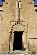 Southern façade and portal to the church.