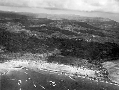 Asan's Green and Blue Beaches stretch from Asan town (left center) to Asan Point (lower right)
