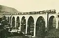 BT opening train with own and SBB passenger cars on the Glatt valley viaduct near Herisau