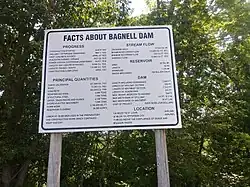 A sign that presents information about the dam and its construction