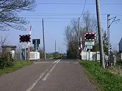 A half-barrier level crossing known as an AHBC near Waterbeach, Cambridgeshire