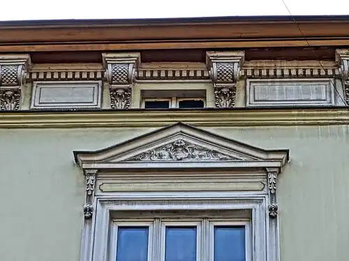 Pediment and corbels