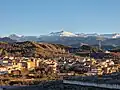 View of Beas de Granada and Sierra Nevada in the background