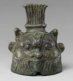 Bell in the form of Bes; 332-30 BC; cupreous metal; height: 6.3 cm, diameter: 4.6 cm; Metropolitan Museum of Art