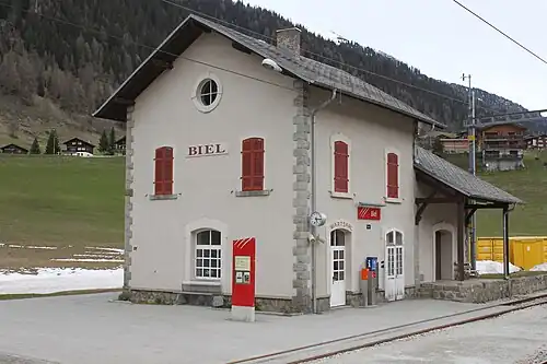 Two-story building with gabled roof
