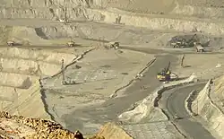 Blast-hole drilling at the Bingham Canyon Mine, Utah. Note the pattern of drill holes being prepared for blasting.