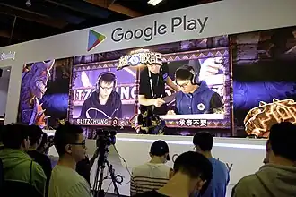 Blitzchung, a pro-democracy player representing Hong Kong, in a tournament against another player, at the Google Play Booth B211, World Trade Center One.