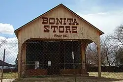 The Bonita Store in Bonita, formerly a saloon where Henry McCarty, aka Billy The Kid shot and killed Francis P. Cahill (a local blacksmith) for assaulting and bullying him on August 17, 1877.[citation needed]