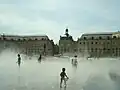 The Miroir d'eau misting