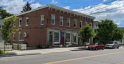 This brick building, built in 1862 by Samuel Fogg and Ansel Loring, used to house (from left to right) Marston's dry goods store and Leone R. Cook's apothecary