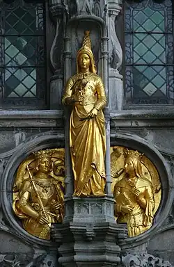 Guilded statue of Mary of Burgundy on the façade