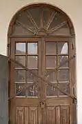 Colonial-style wooden door of Burdwan House.