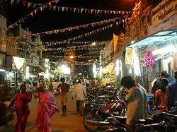 image of a street with shops in twilight