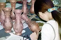 Adding cloisons according to the pattern previously transferred to the workpiece