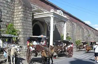 Kalesa parked in front of Vigan Cathedral