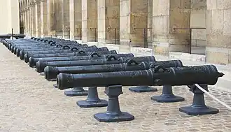 A series of bronze Canon de 12, époque of Louis XV, Honorary Courtyard (French: Cour d'Honneur) of Les Invalides.[5]