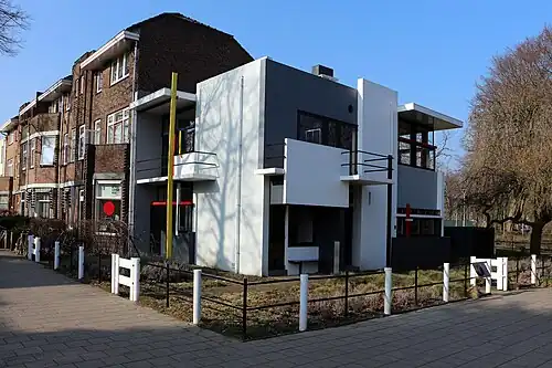 De Stijl – Rietveld Schröder House in Utrecht, Netherlands, by Gerrit Rietveld (1924)[65]
