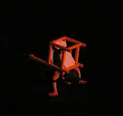 a chair contortionist